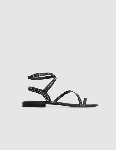 Women's studded leather flat sandal-tongs in black - IKKS
